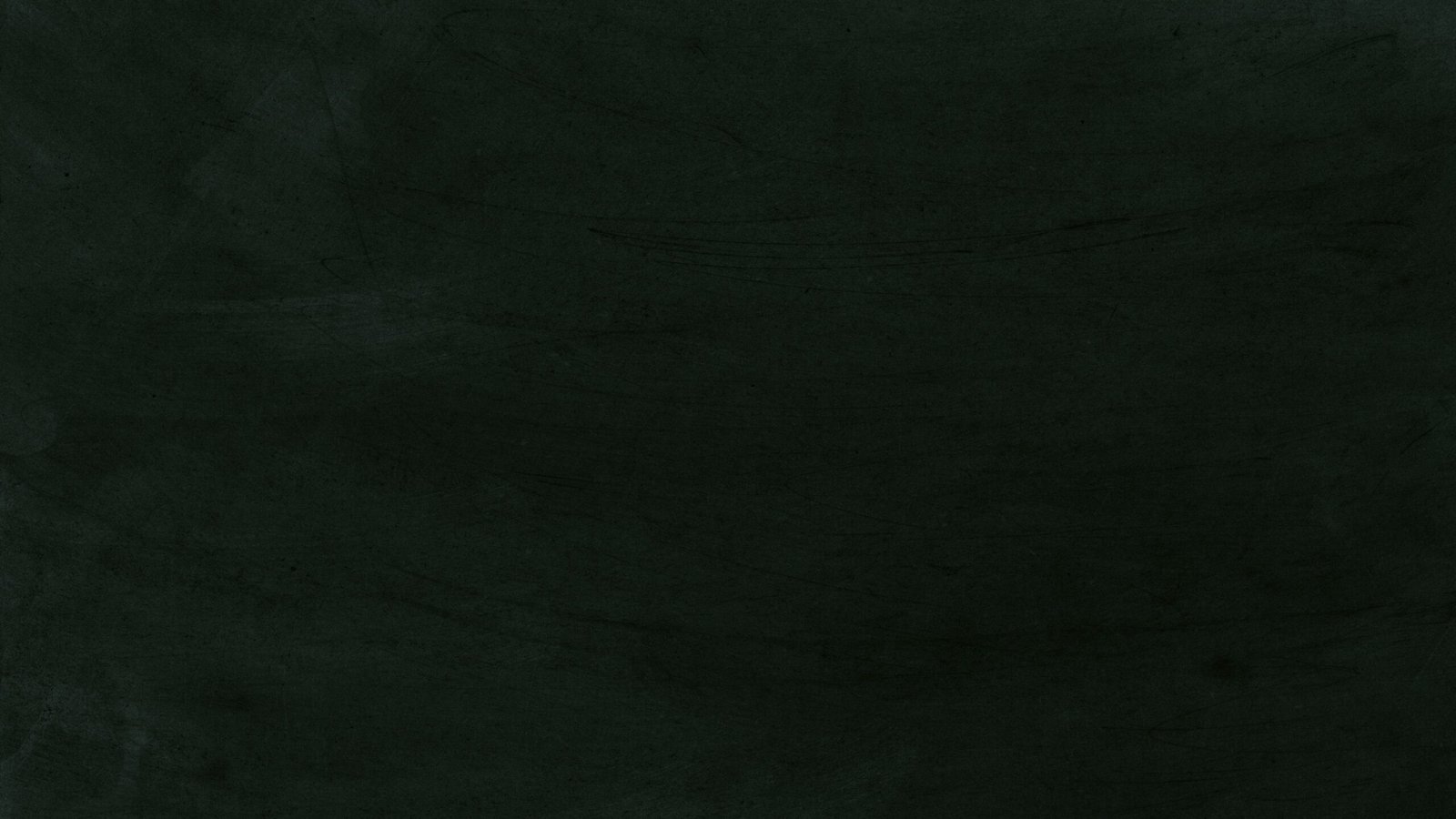 Black chalkboard texture with various chalk marks and scratches.